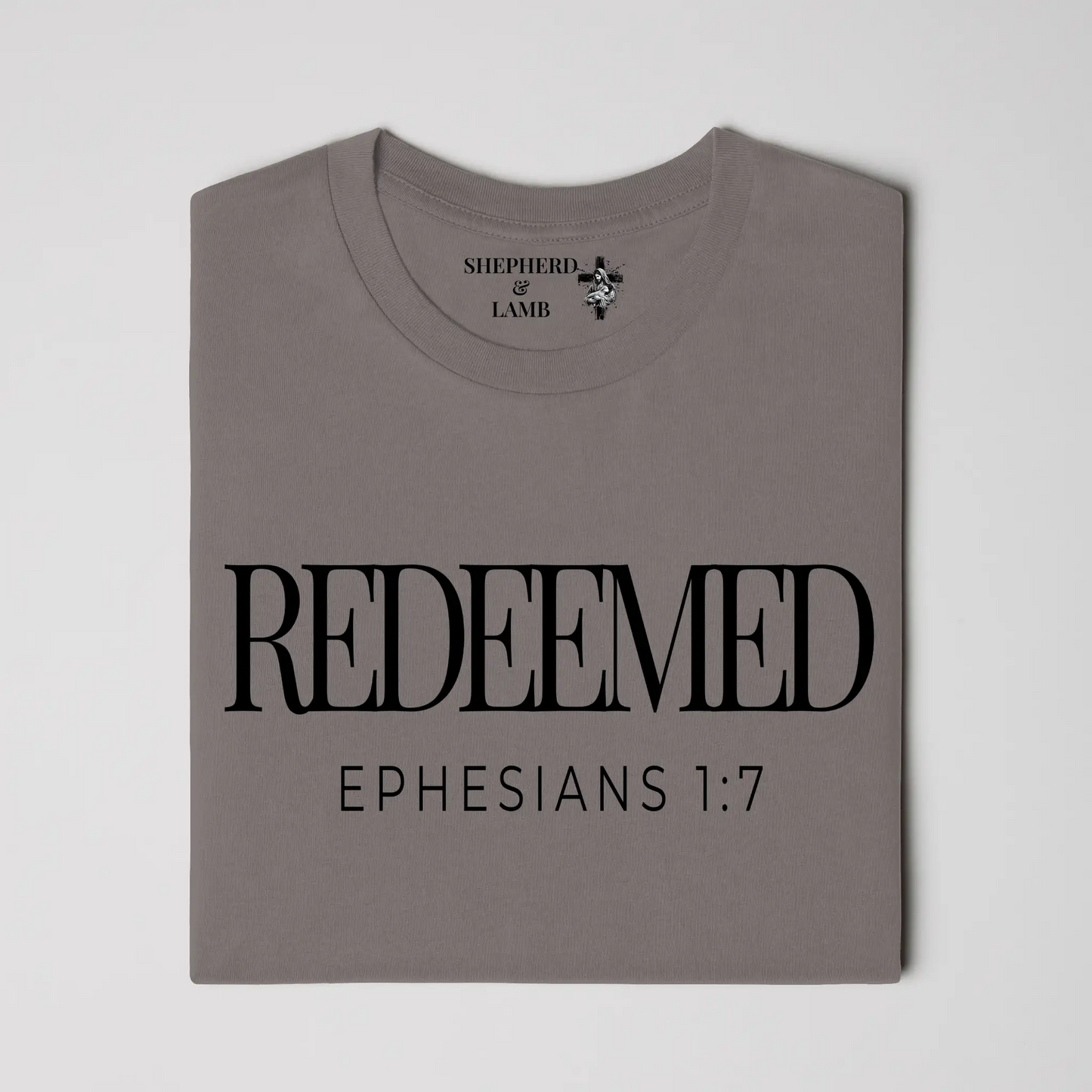 REDEEMED Christian T-Shirt | Ephesians 1:7 Bible Verse Shirt