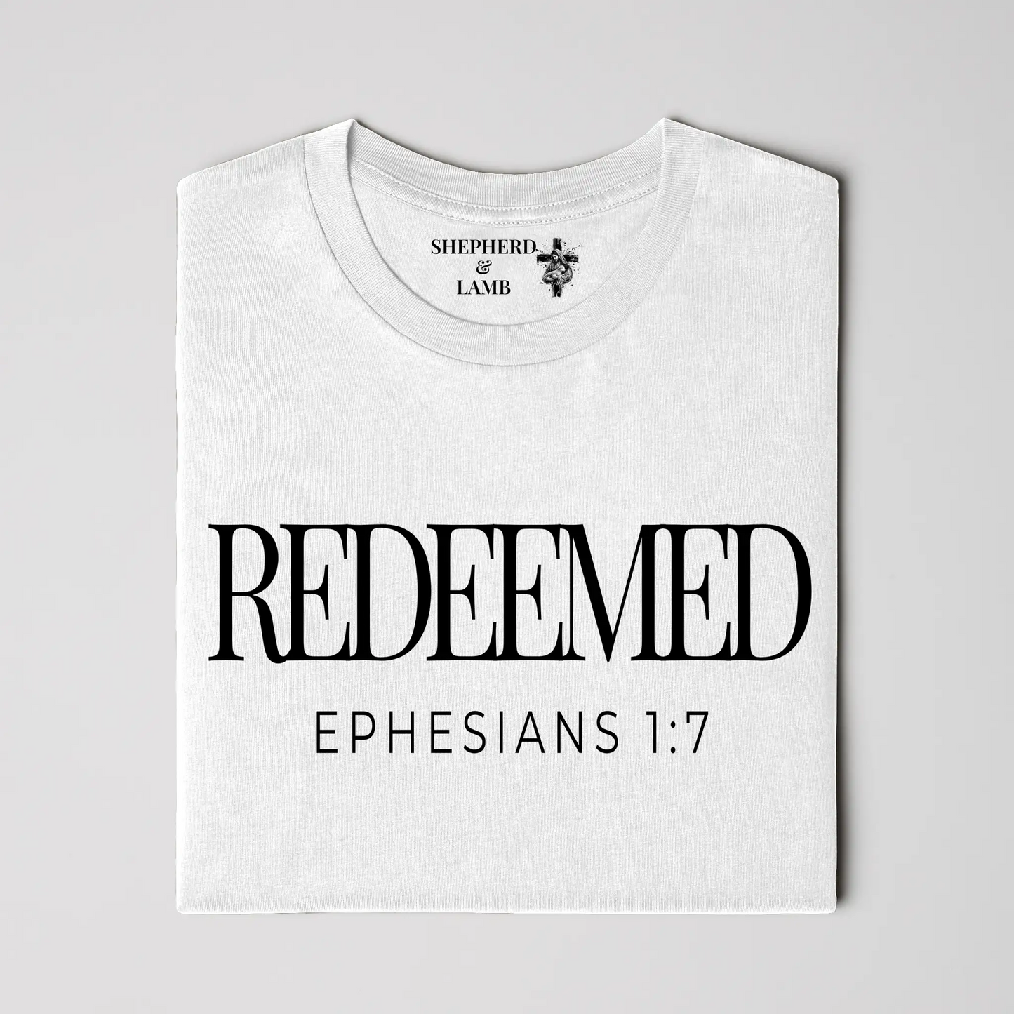 REDEEMED Christian T-Shirt | Ephesians 1:7 Bible Verse Shirt